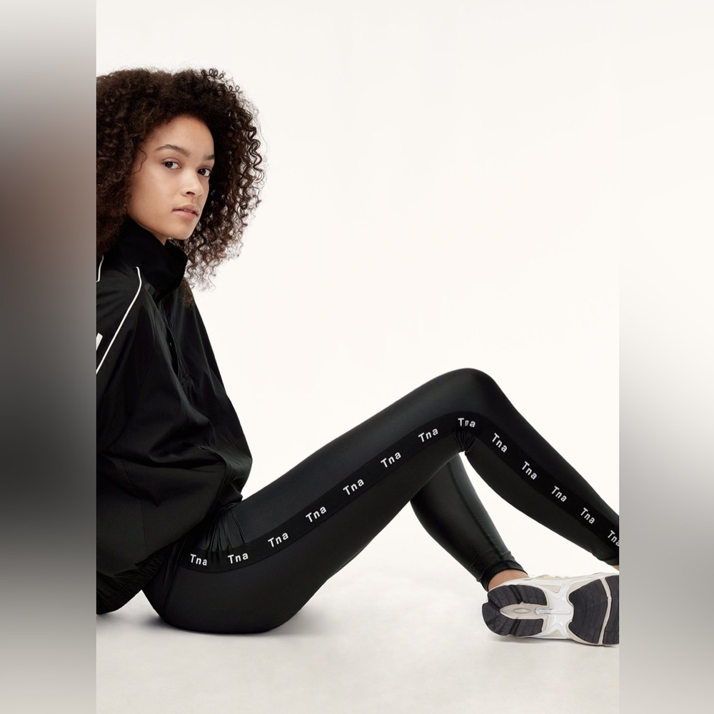 Aritzia TNA Halsam Pant Faux Leather Black Repeating Logo Side Stripe Leggings S